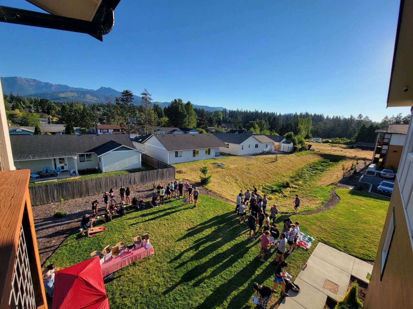 A photo overlooking the welcome party from the balcony.