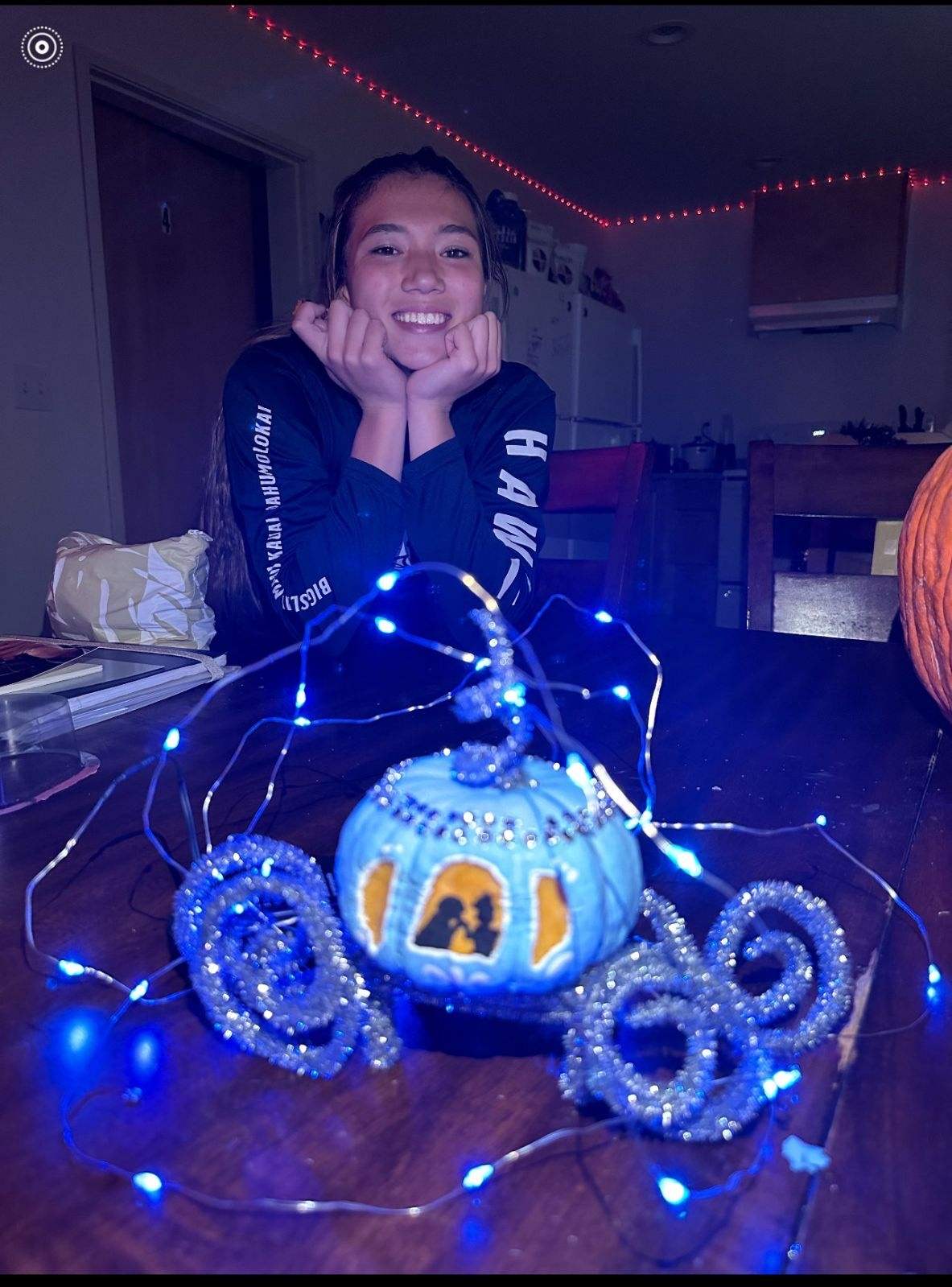 Resident with her pumpkin that she made into the fariy godmother carriage from Cinderella